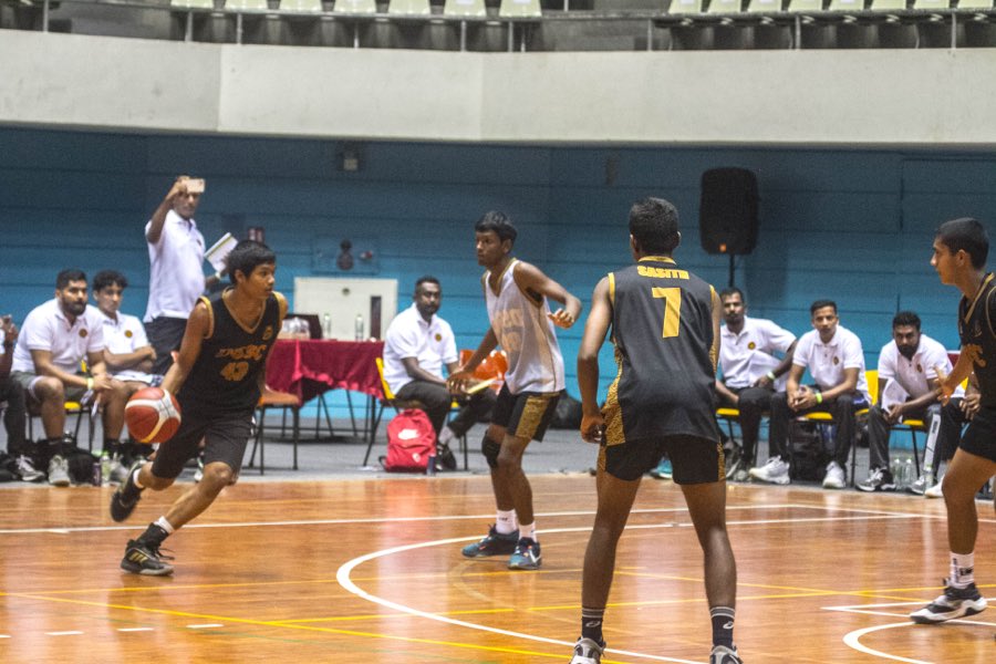 A player driving to the basket